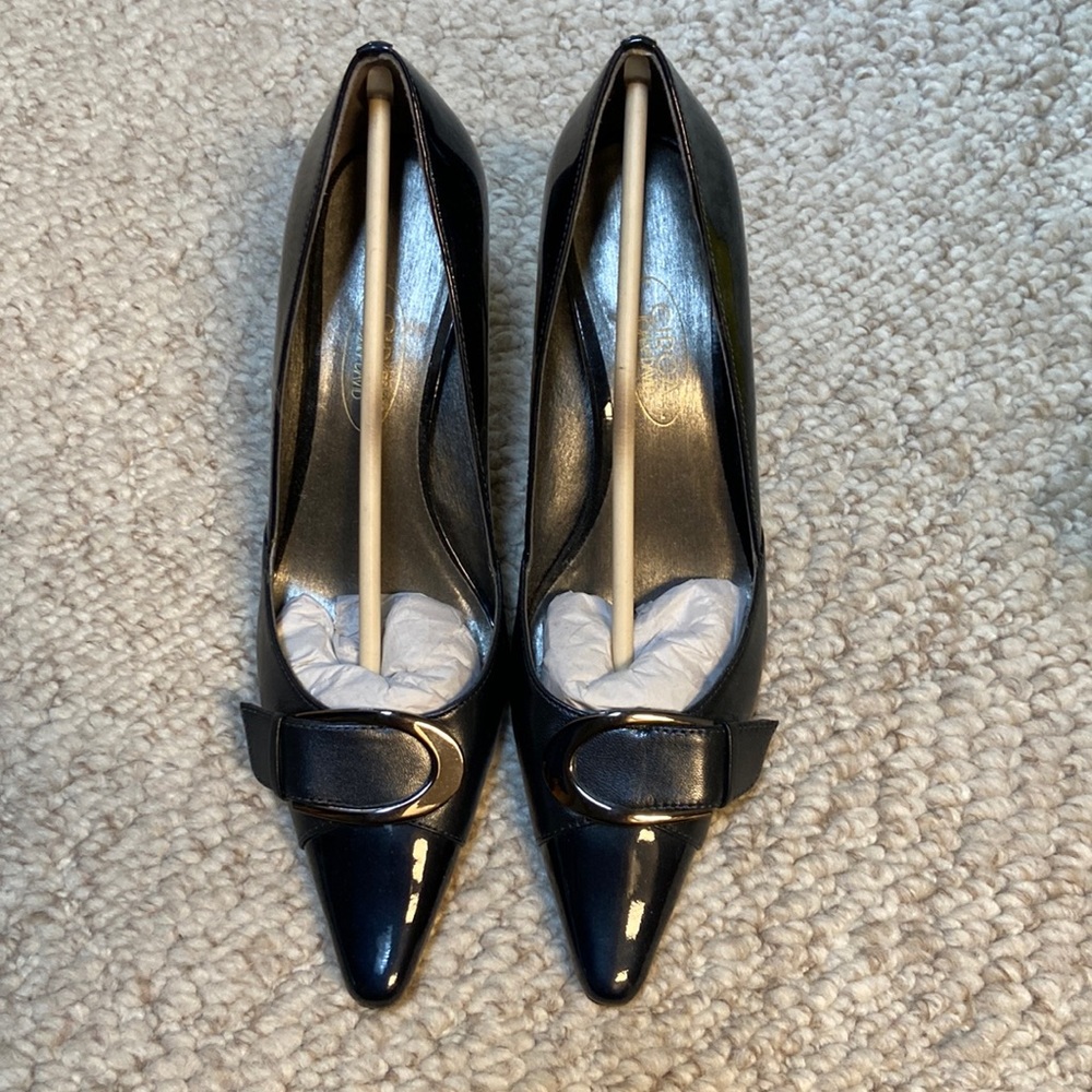Navy low pumps.  Leather soles.  Patent leather